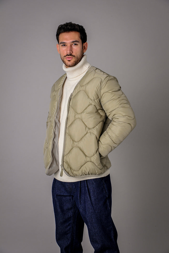 the good neighbour quilted jacket in lt olive